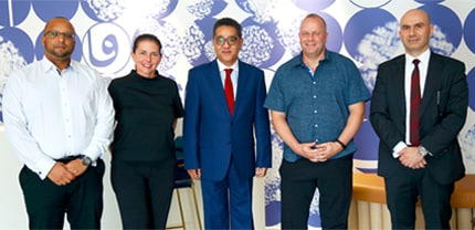 James Michael Lafferty, CEO of Fine Hygienic Holding (second from right), Arun Khehar, Senior Vice President - Business Applications, Middle East, Africa and India (third from right) along with executives from both organizations.