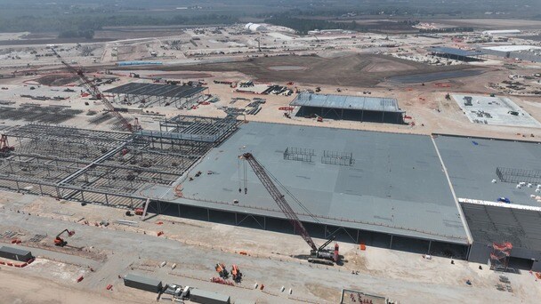 Aerial view of large building under construction