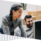 Two pwoplw working on a computer