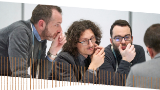 Three people learning at CloudWorld