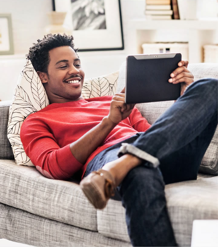 Man looking at tablet
