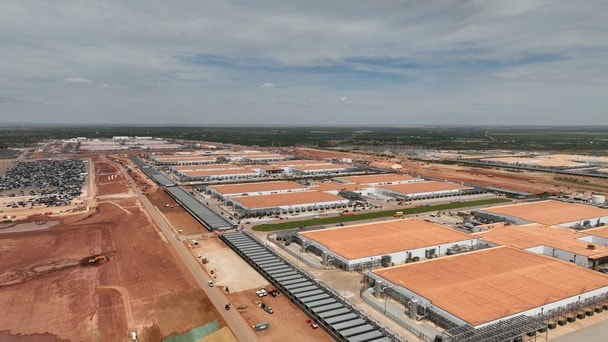 Aerial view of a large data center campus under construction